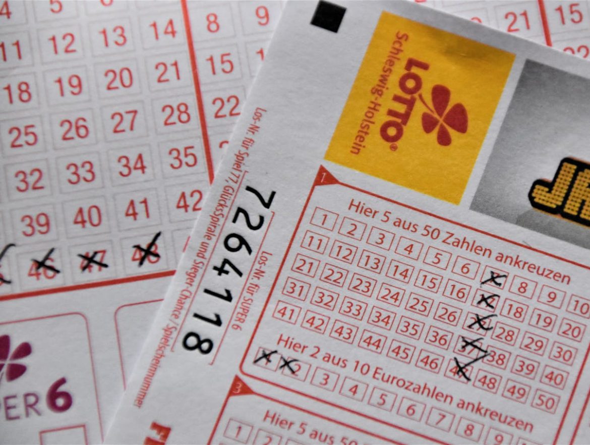 Detailed close-up of a EuroJackpot lottery ticket with selected numbers in focus.