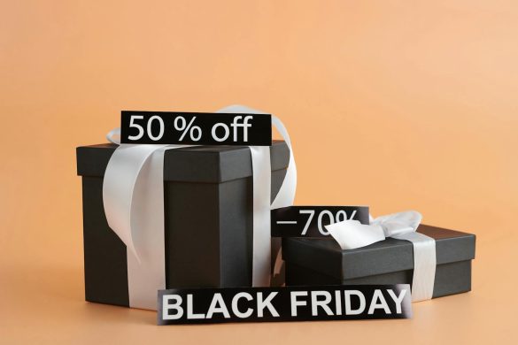 Black gift boxes with discount tags for Black Friday, ideal for advertising sales and retail promotions.