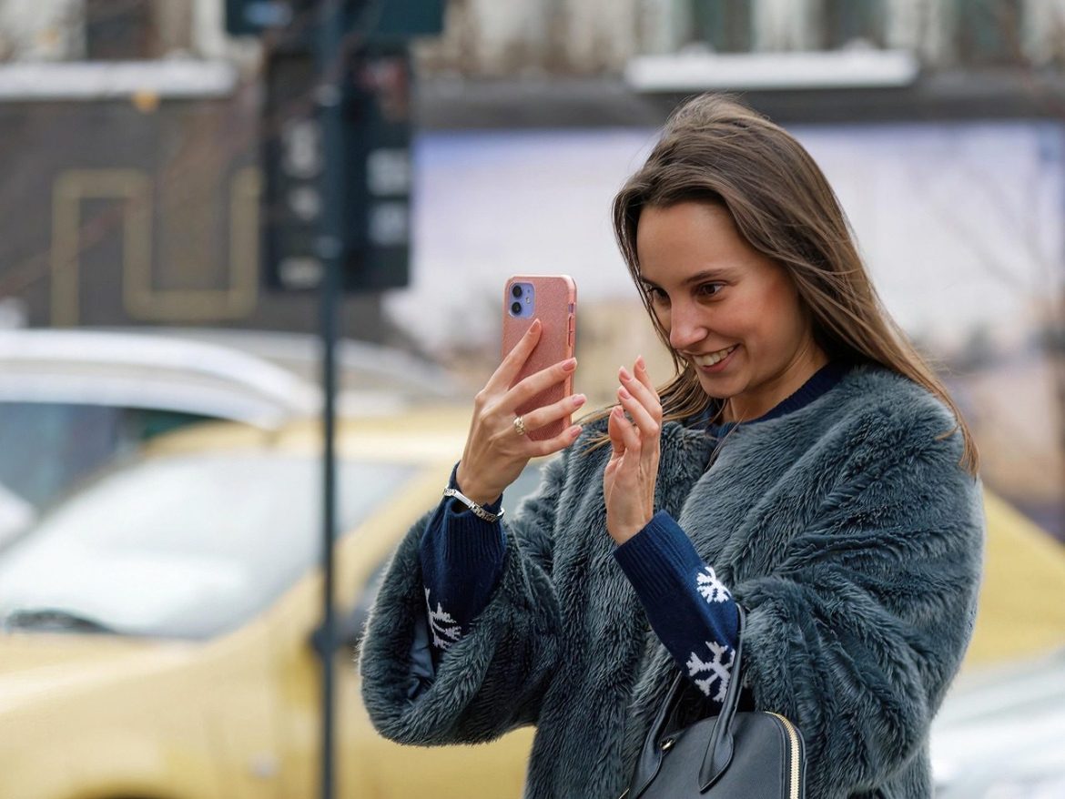 woman, phone, casual, street, young, happy, surprised, outdoors, urban, lifestyle, smiling