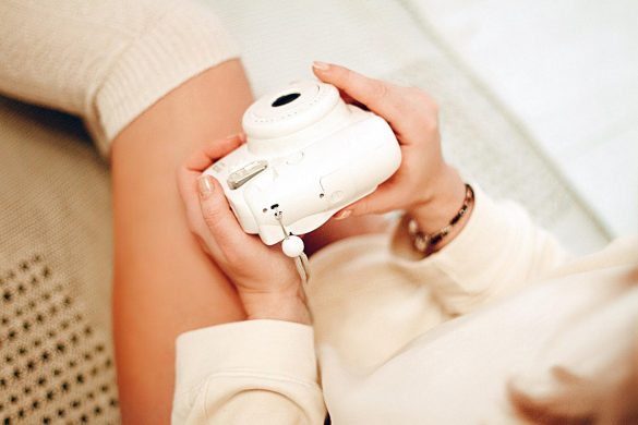 thigh high socks, polaroid camera, woman, cozy, legs